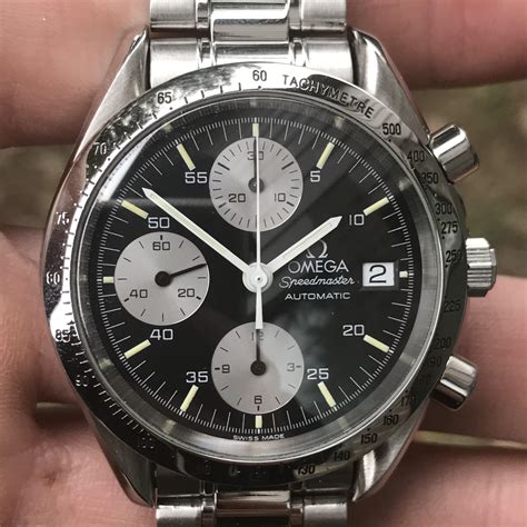 omega speedmaster date panda.